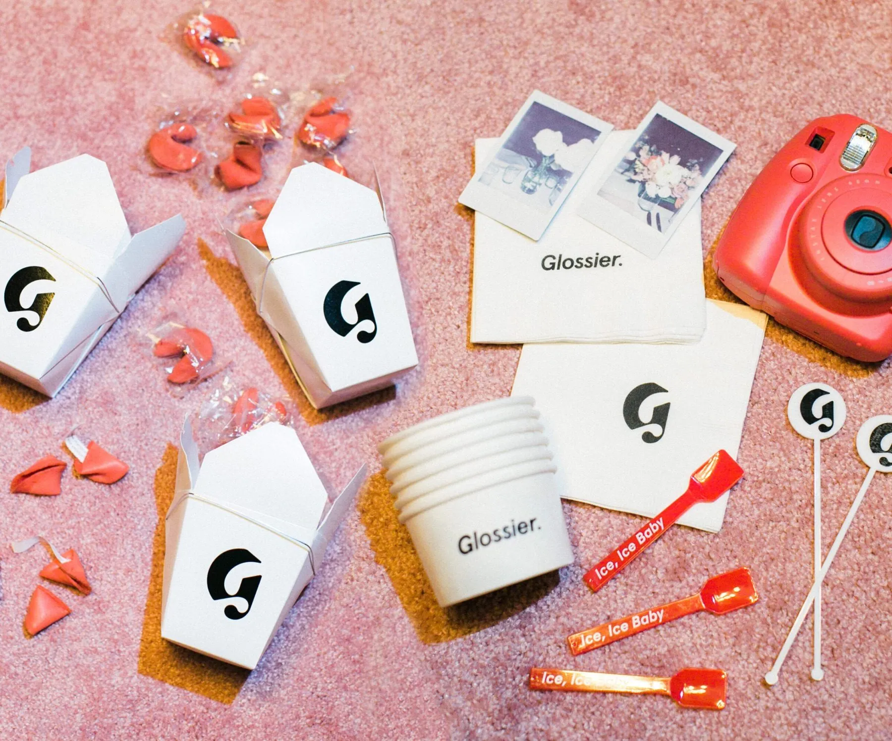 Glossier brand dinner event with designed tablescape and floral installations