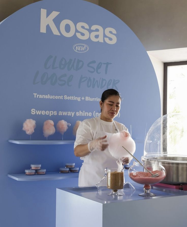 Kosas Cloud Set Loose Powder launch activation with cotton candy station and branded arch display