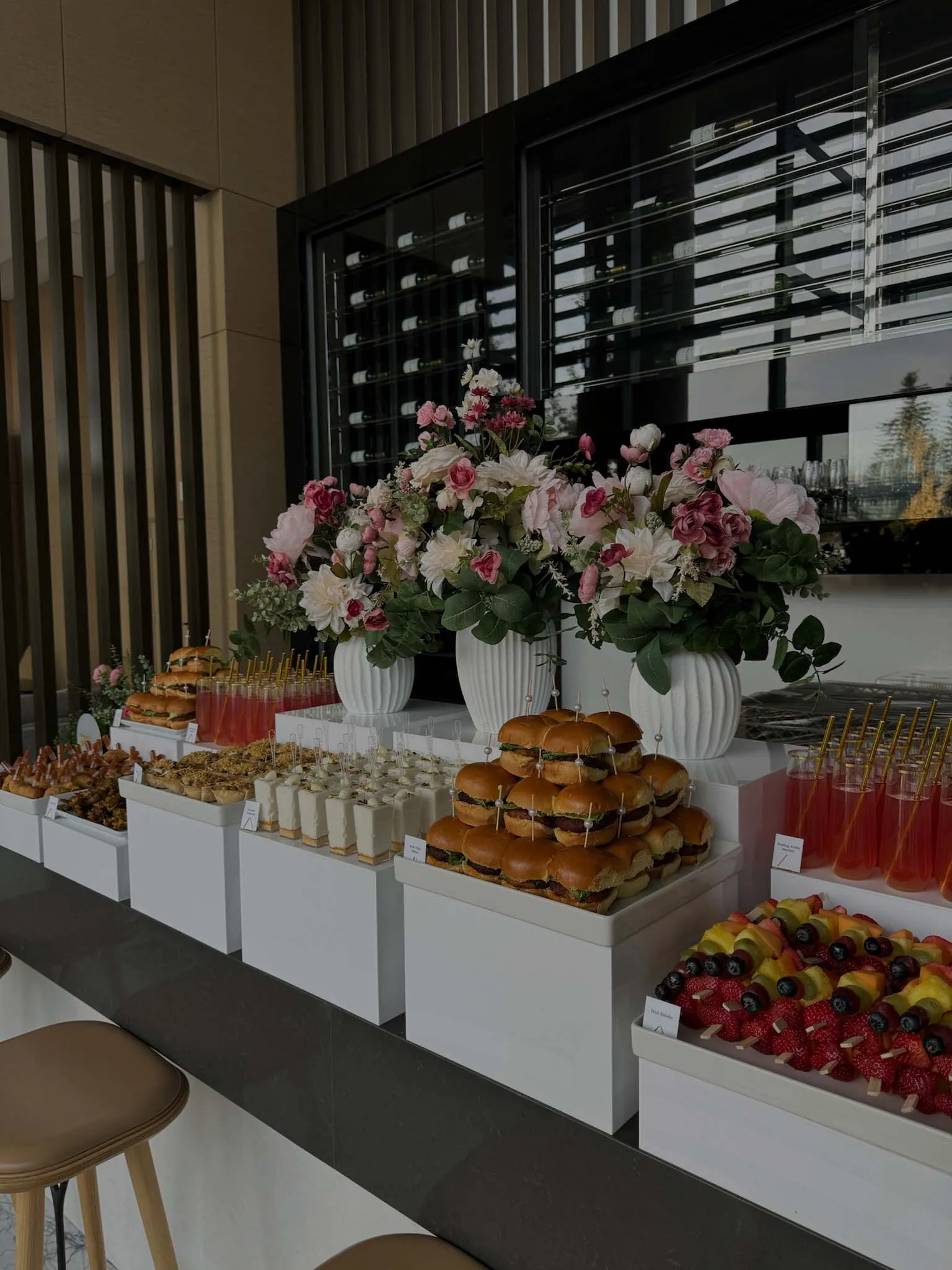 Branded food and beverage pop-up activation with designed service station and styled tasting environment