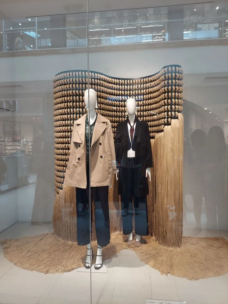 Zara storefront window display featuring a textile and rope installation by a commissioned artist