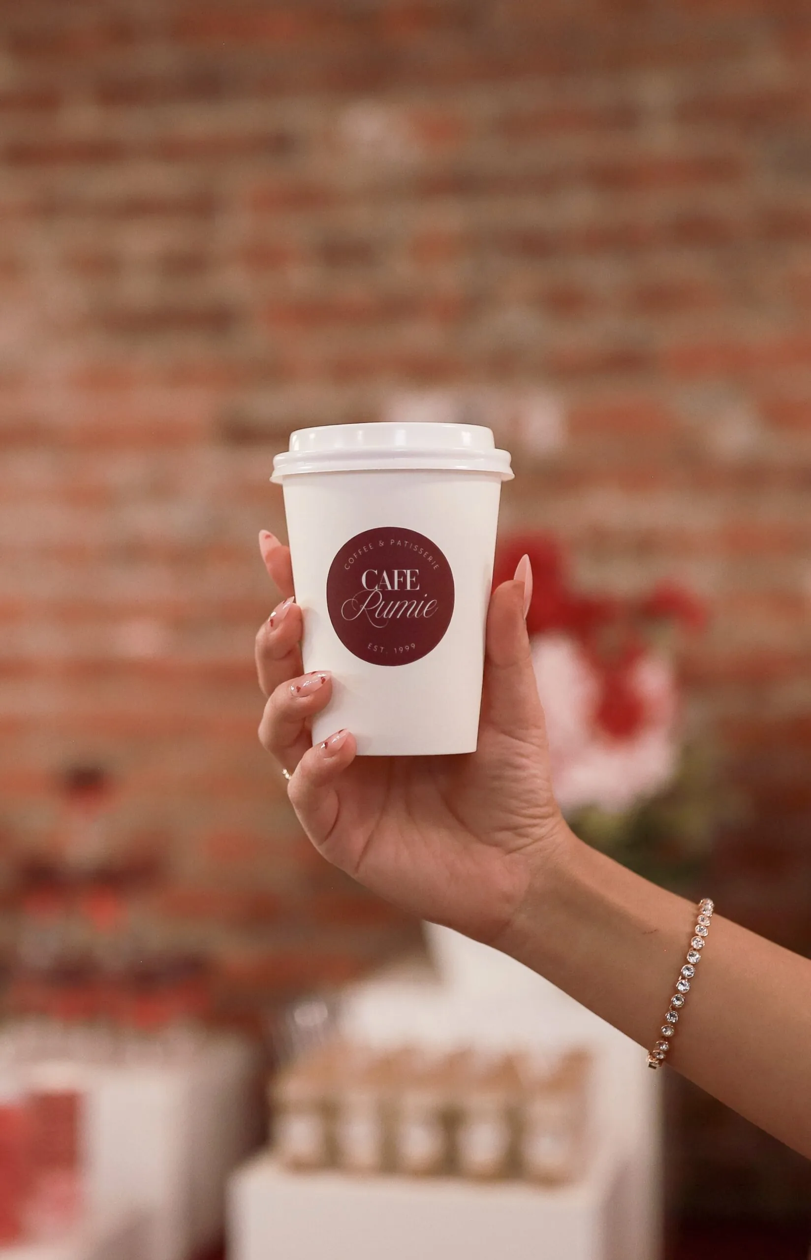 Custom branded coffee cup at Ma Cherie bridal shower, experience design Calgary