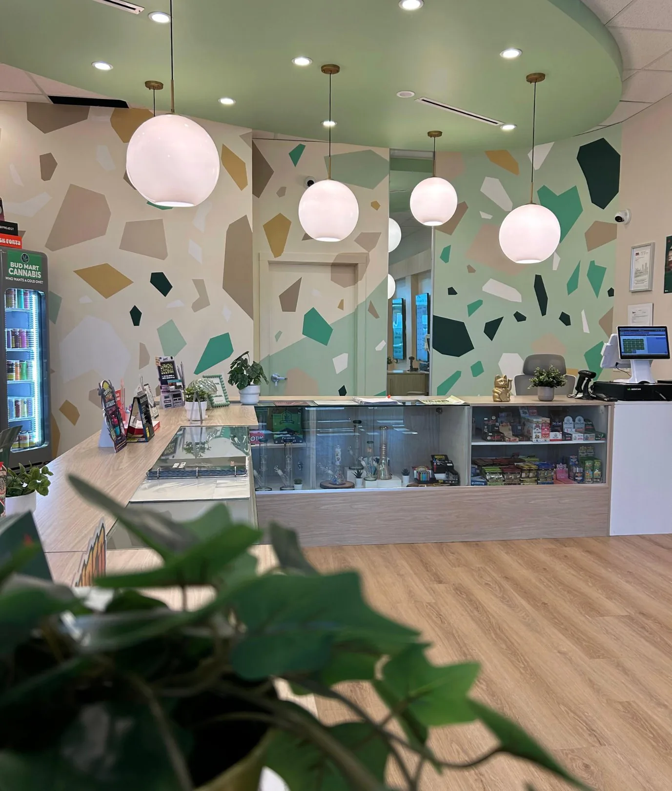 Mosaic Earth, a wraparound interior mural for Bud Mart Skyview, Calgary, by KINN Studios